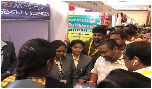 Students interacting with Mr. Vellampalli Srinivas (M.L.A) at Rota Fair